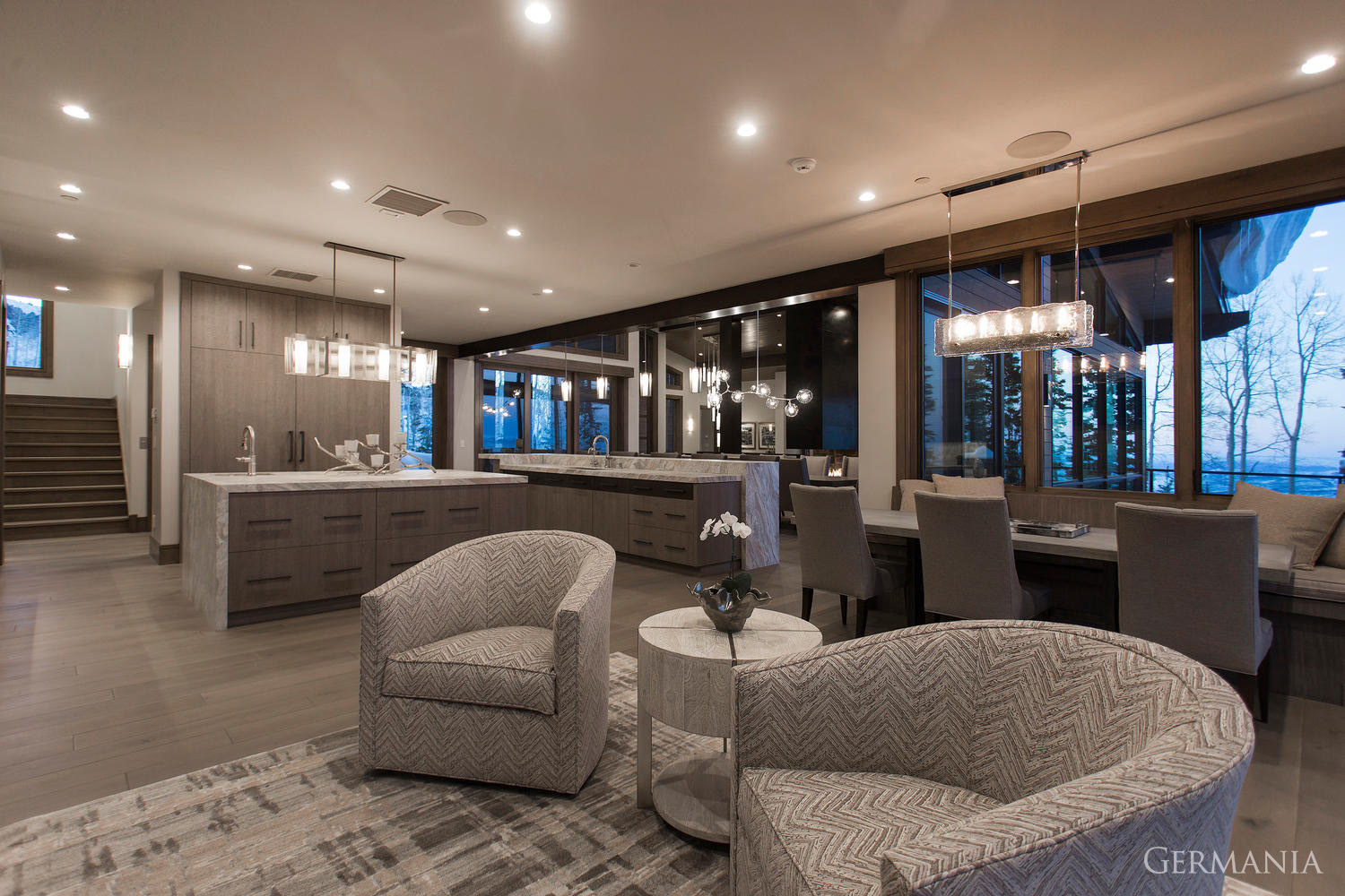 Germania can design the most memorable custom luxury home dining room. Luxurius cabinets and incredible light fixtures bring mountain living to life.