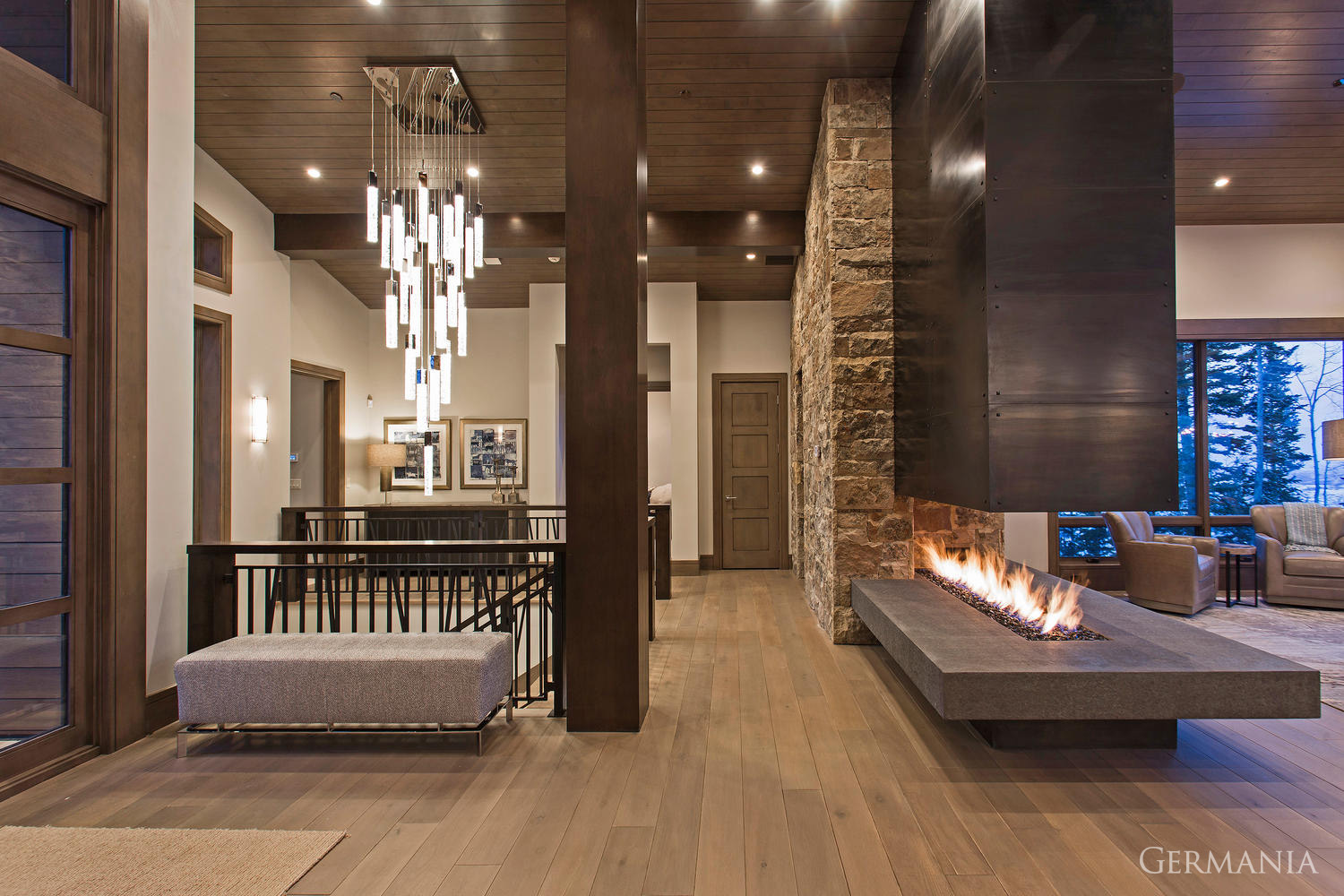 Our custom home building features custom light fixtures and fireplaces. The entry way to your custom home sets the mood.
