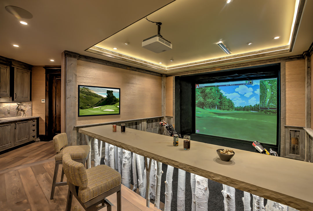 Park City Custom Home Golf Simulator by Germania Construction
