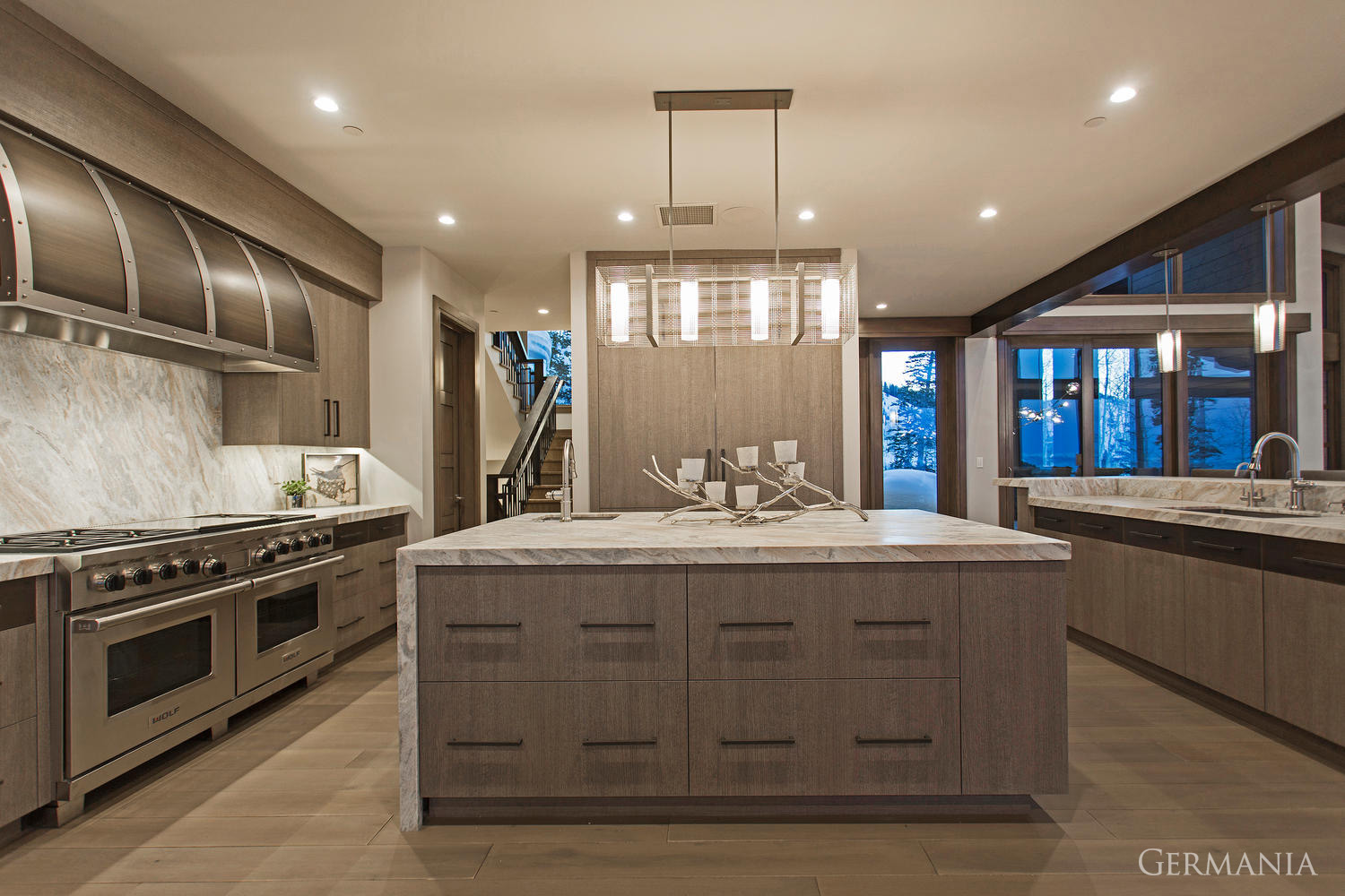 Vacation home kitchen design is a crucial component to Germania Construction luxury homes. From range hoods to light fixtures, each element of your custom home is important to Germania.