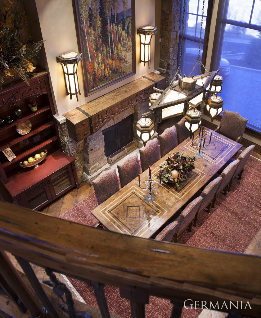 Here is an aerial view of custom luxury home dining room. This is what you can expect from Germania. Unique lighting, impeccable stone work, one of a kind flooring…everything Germania touches screams luxury.