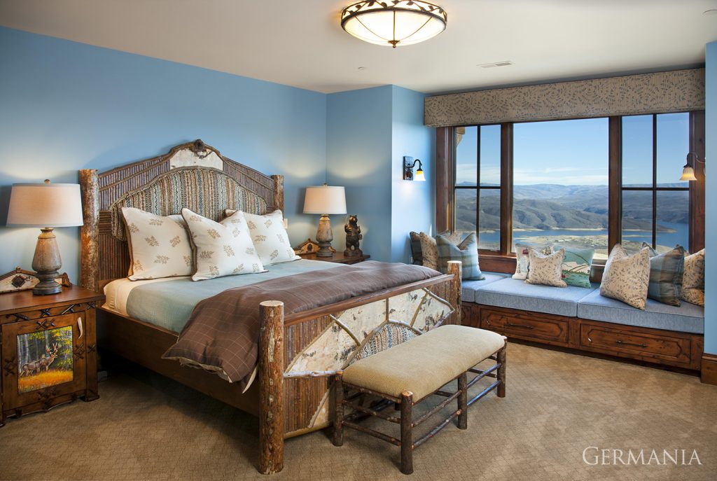 Comfy carpet, window bench, and huge windows for those incredible views are what to expect with a custom built bedroom.