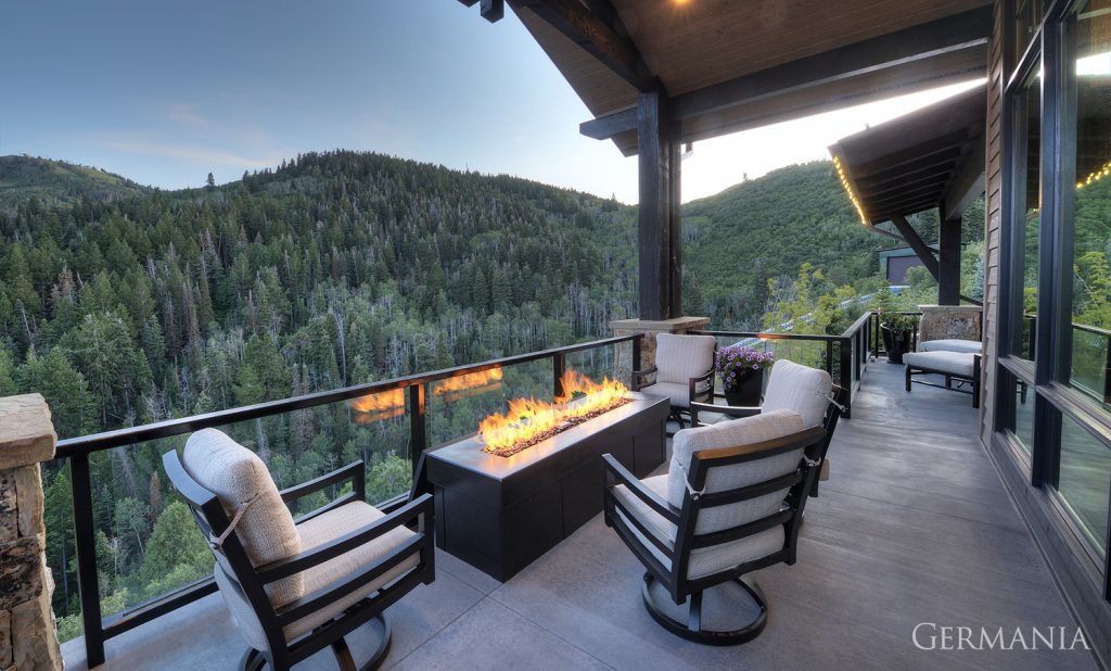 With this custom luxury home deck, we featured a fireplace and custom railing.