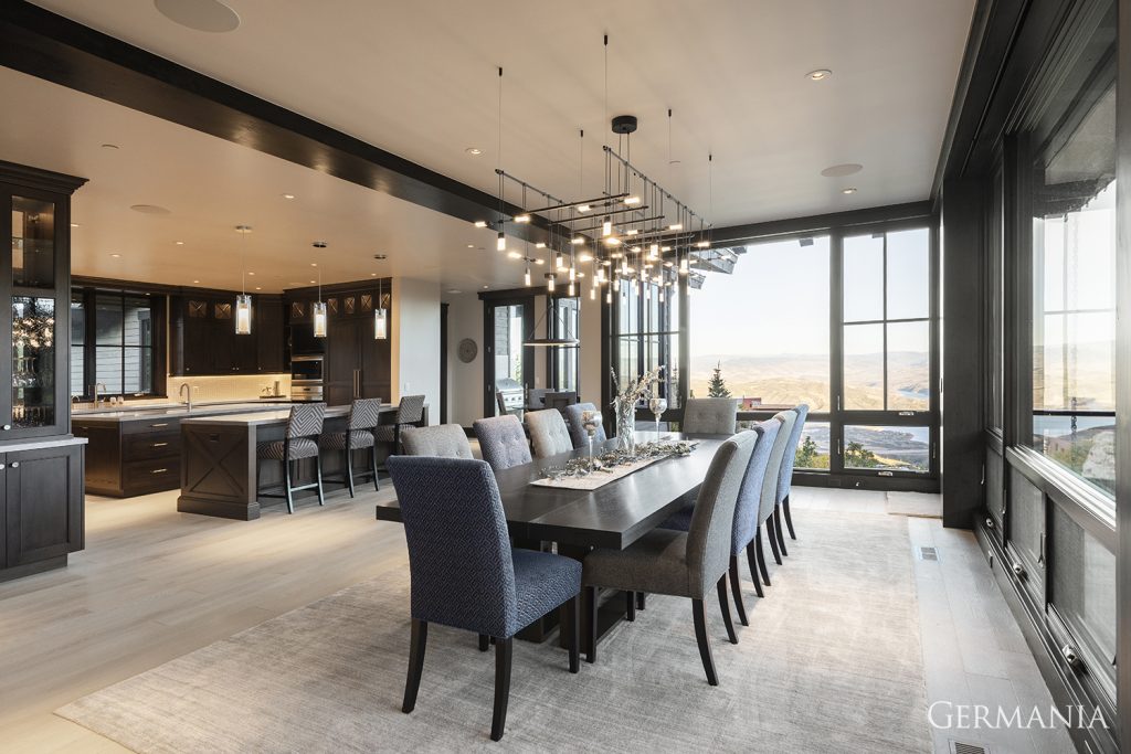 Design your own mansion dining room with Germania Construction. Beams, light fixtures, flooring…all of them are important aspects of luxury home design.