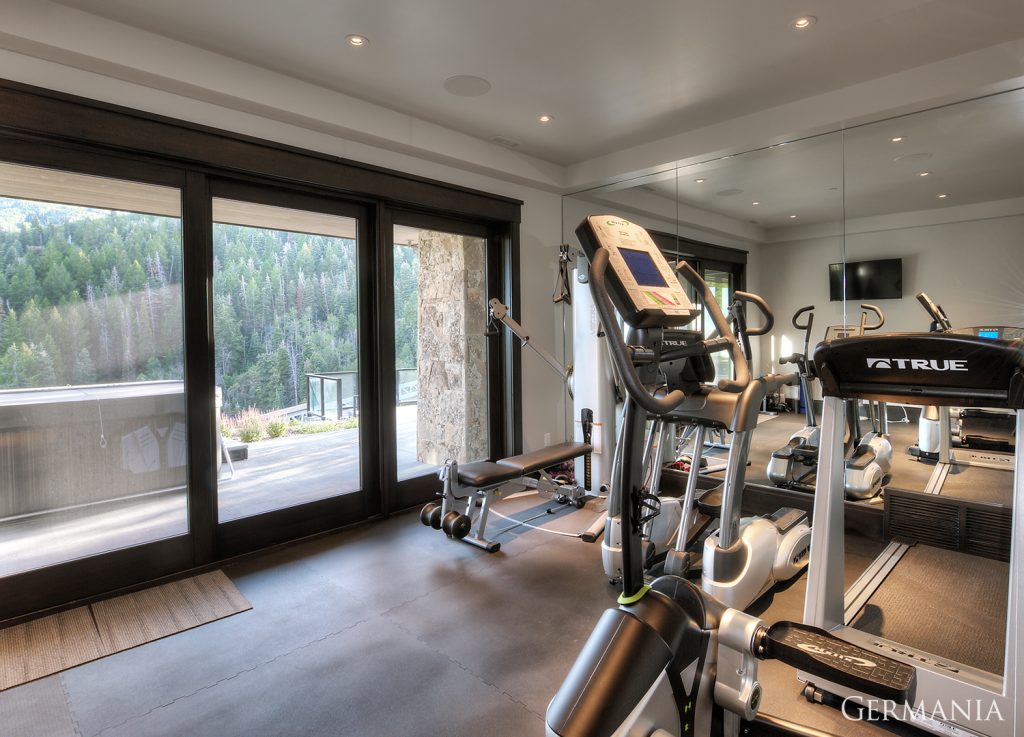 Even the design of your exercise room should receive attention. One of the many things to consider when choosing a luxury home builder.