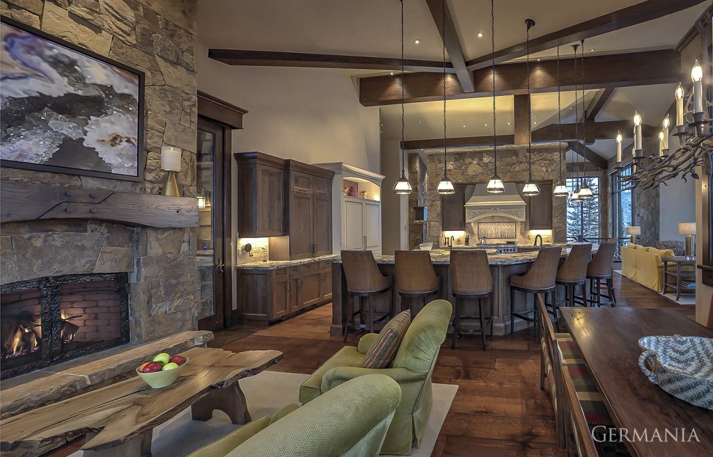 This floor plan features a luxury home kitchen floor plan in Park City Utah by Germania Construction. We've emphasized the fireplace and beams in this incredible kitchen.