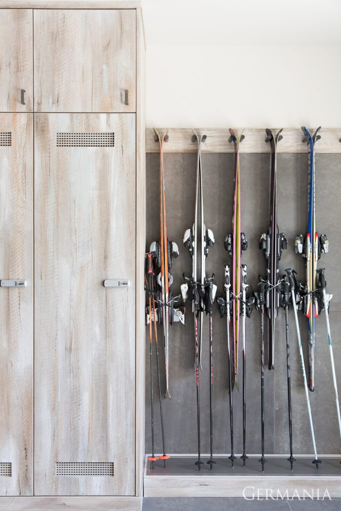 In this high end custom home by Germania, we built a skiroom with boot dryers and individual lockers!