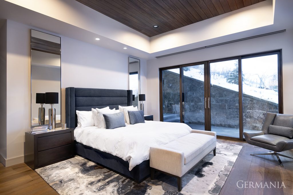 Beautiful bedroom with ground level walkout patio.