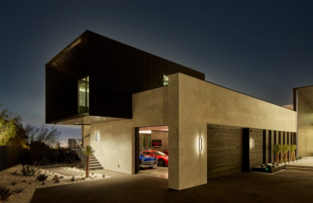 Take a peak inside this garage with classic cars on display.