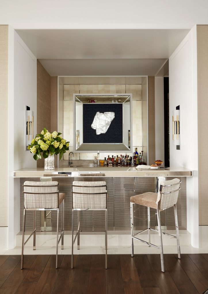This high end wet bar with seating is great for hosting parties or settling in for a nightcap.
