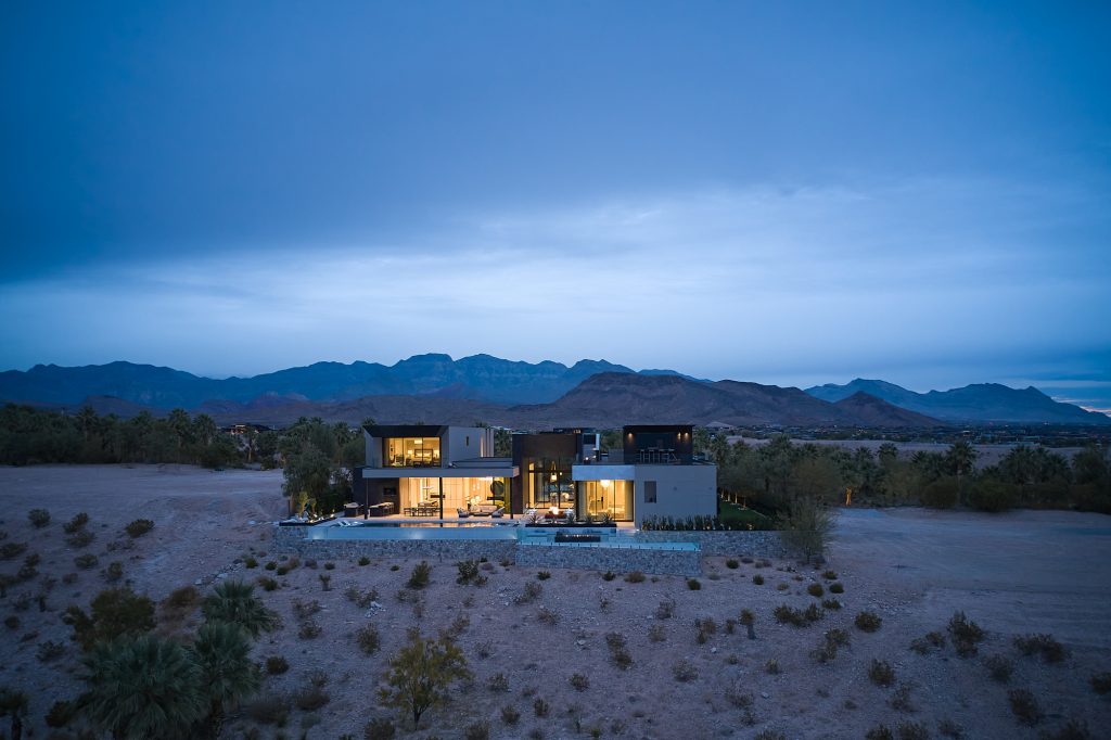 Set in the desert, this home features a pool and fire pit and is the perfect place to escape and relax.