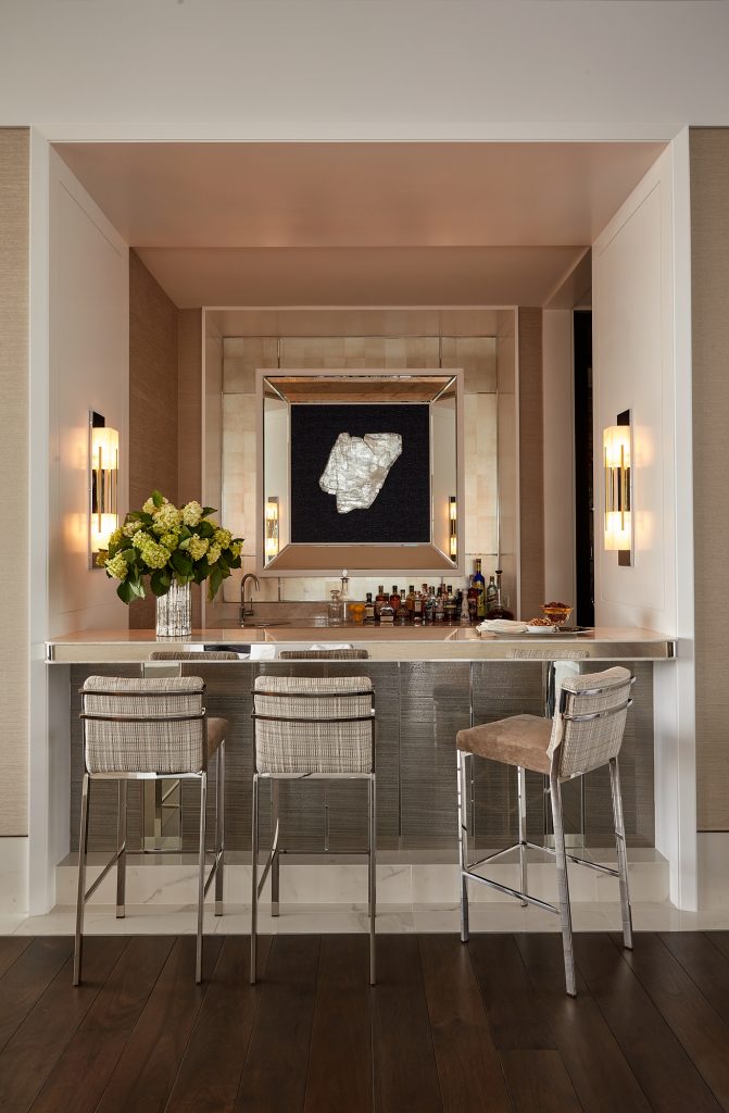 Step up to this beautiful custom wet bar for a drink or casual conversation.