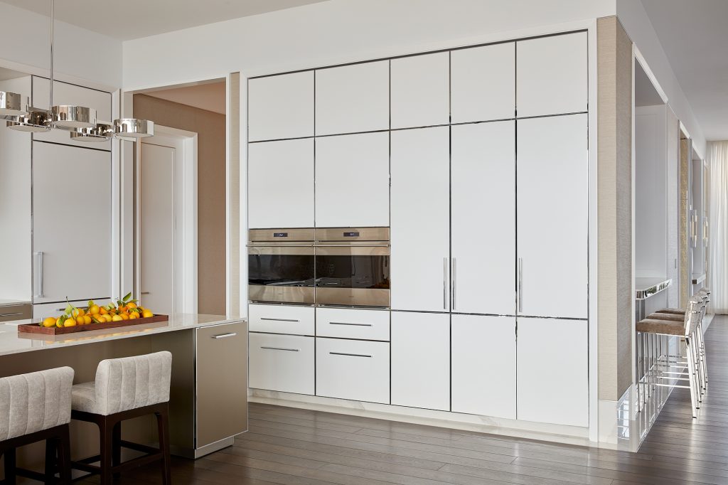 Sleek finishes and clean lines are the name of the game in this modern kitchen.