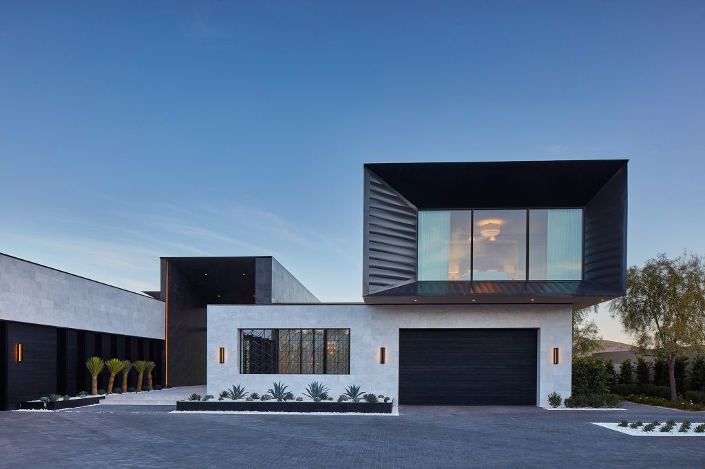 Mixed materials and geometric shapes give the exterior of this home a unique look.