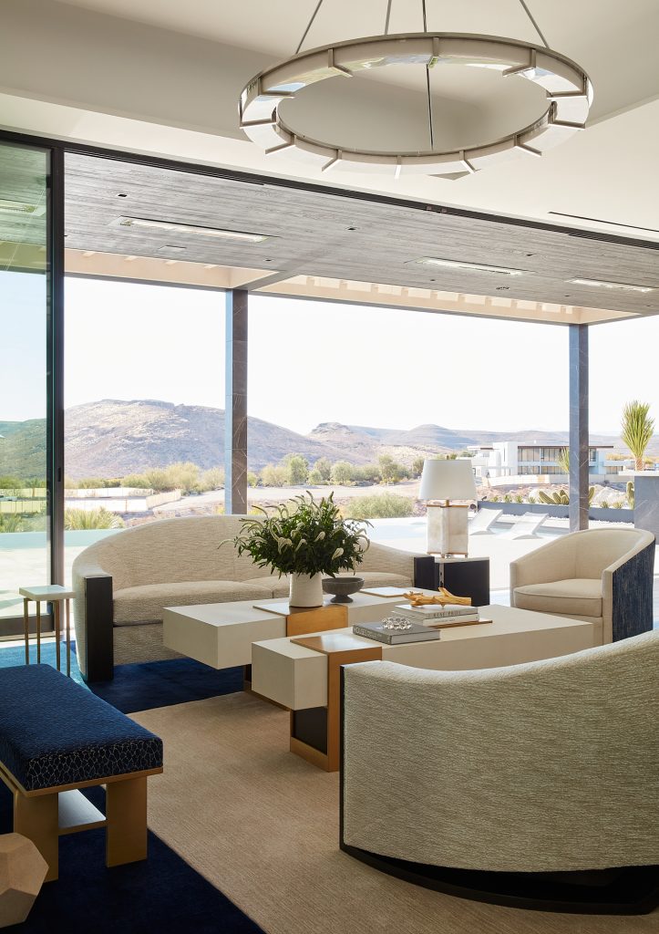 A breathtaking desert view enhances the clean lines of this modern living room design.