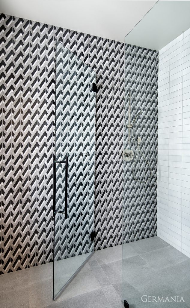 Patterned tile adds a modern and fun touch to this bathroom shower.