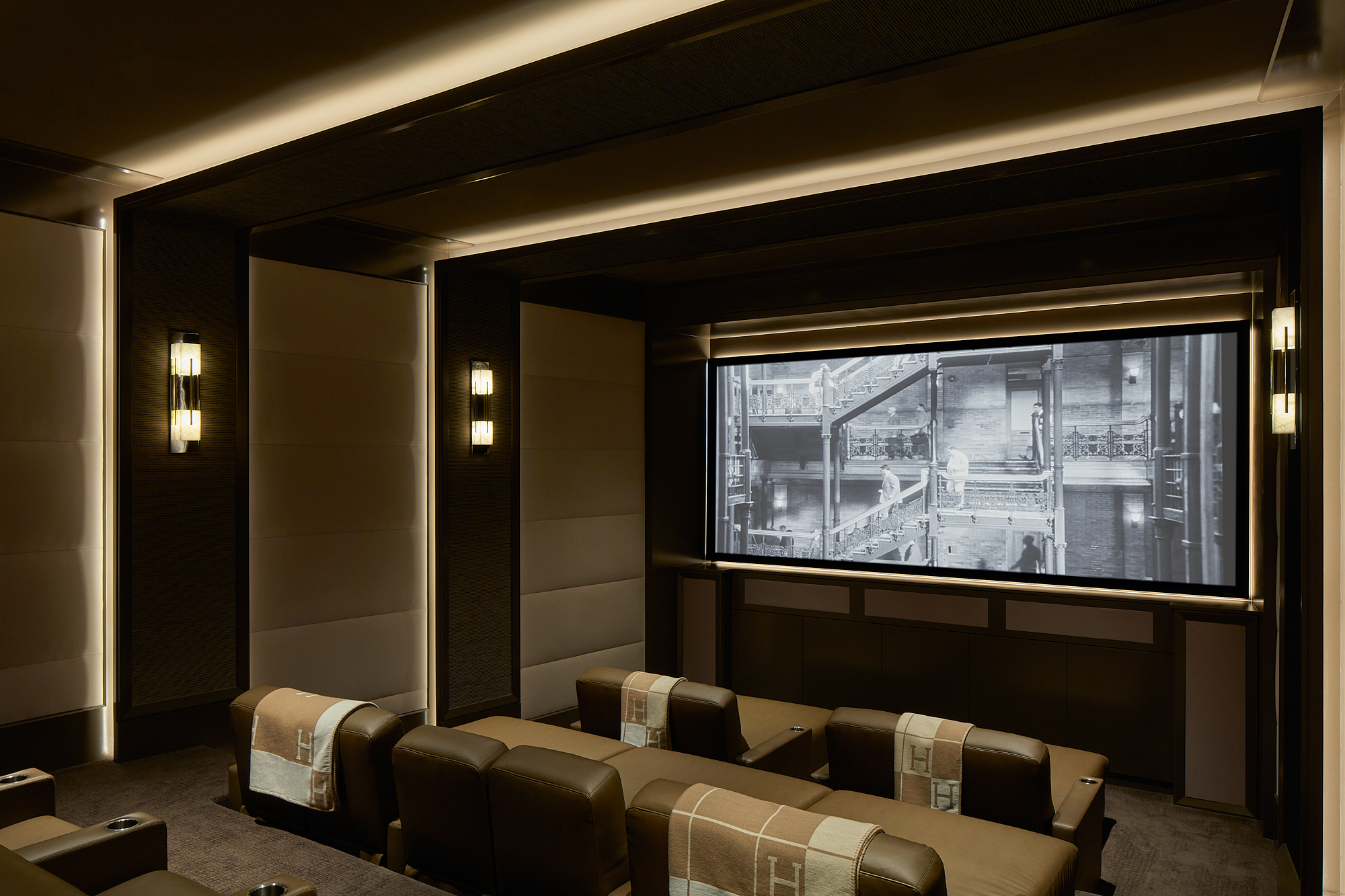 Sit back and relax in the comfort of your custom built personal movie theater.