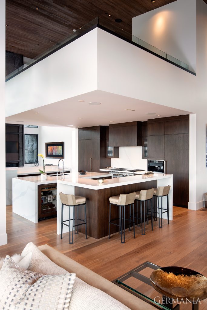 Who wouldn't love coming home to this beautiful kitchen? Everything about it is perfect, from the custom built cabinets to the stunning countertops. Every detail was designed with family and friends in mind.