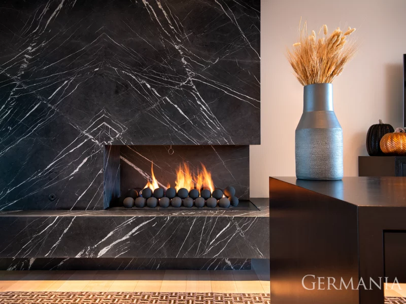 High-end, custom-built, luxury black marble fireplace in Park City, UT.