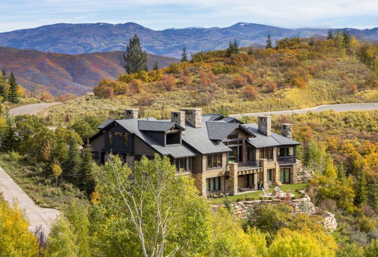 Luxury custom-built Park City, UT, home surrounded by fall foliage